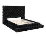 Stefania Black Queen Bed, upholstered slat base and tufted headboard, three-quarter studio view
