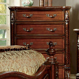 Flandreau Brown chest, five drawers with carved accents and ornate pulls, front view