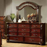Flandreau Brown dresser with mirror, nine drawers and ornate scroll crown, front view