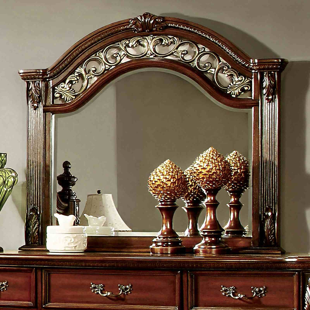 Flandreau Brown mirror, arched carved frame with gold scrollwork detail