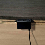 Camryn Warm nightstand power hub, USB charger detail under the tabletop, close-up