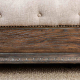 Lysandra Rustic wood finish sample, rustic natural tone grain and carved trim close-up