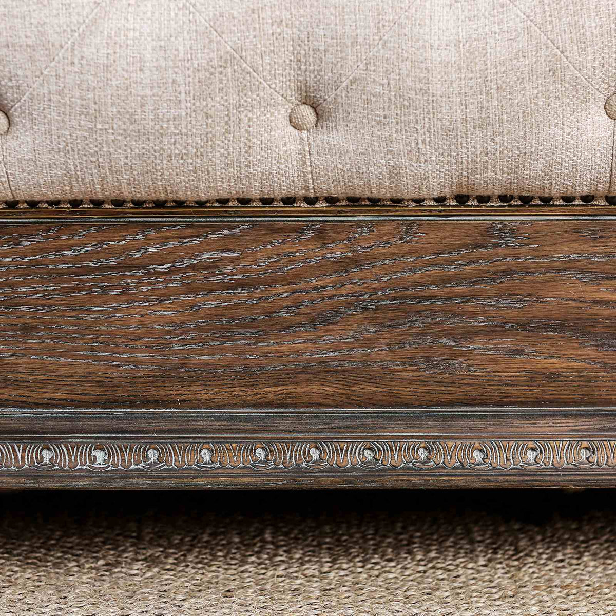 Lysandra Rustic wood finish swatch, warm rustic brown grain with carved trim detail