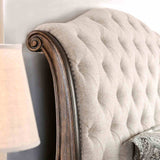 Lysandra Rustic bed headboard detail, tufted beige upholstery and curved wood frame