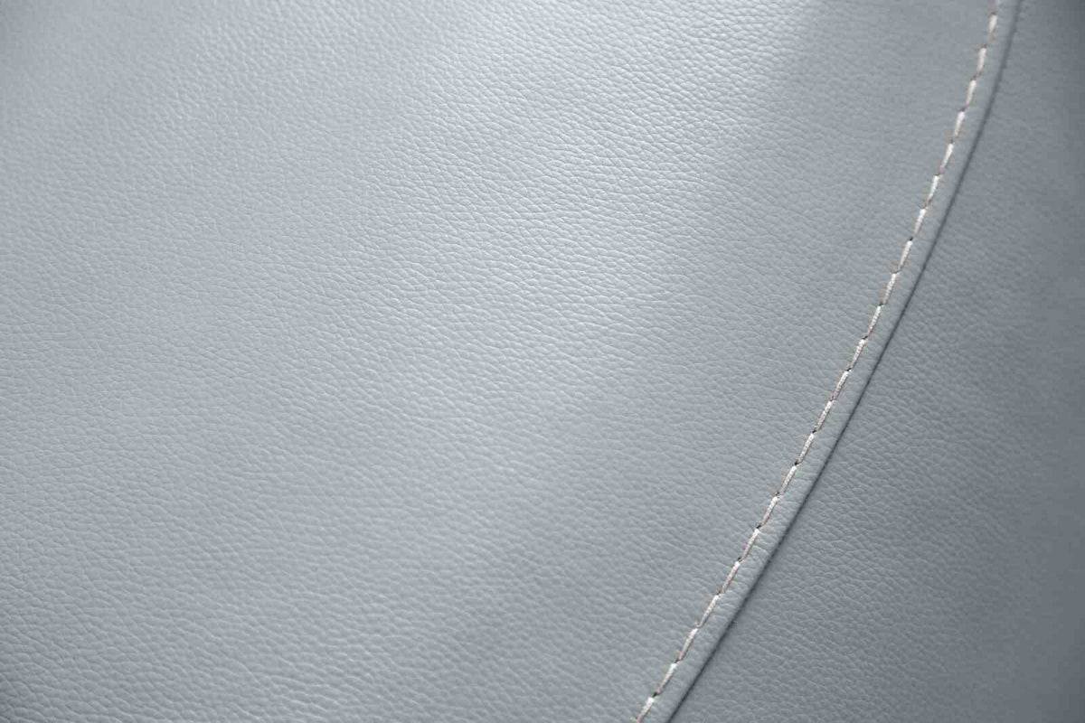 Phineas Pale loveseat upholstery detail, pale blue grain and stitched seam