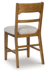Cabalynn Oatmeal/Light Brown Counter Height Barstool, Set of 2 from Ashley Furniture - Luna Furniture