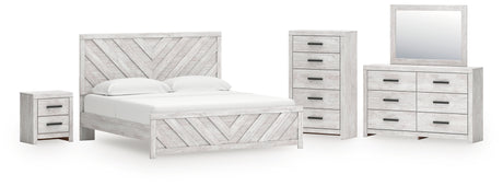 Cayboni King Panel Bed with Mirrored Dresser, Chest and Nightstand in Whitewash from Ashley - Luna Furniture