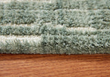 Cayworth Teal/White Medium Rug from Ashley Furniture - Luna Furniture