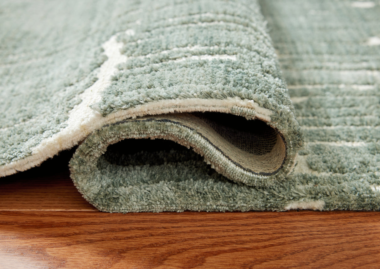 Cayworth Teal/White Medium Rug from Ashley Furniture - Luna Furniture