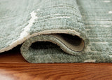 Cayworth Teal/White Medium Rug from Ashley Furniture - Luna Furniture