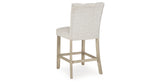Larawyn Bisque Counter Height Barstool, Set of 2 from Ashley - Luna Furniture