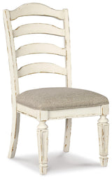 Realyn Chipped White Rectangular Dining Table and 8 Ladder Back Chairs from Ashley Furniture - Luna Furniture