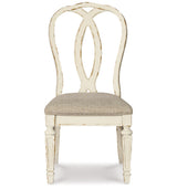 Realyn Chipped White Dining Table and 8 Ribbon Back Chairs from Ashley Furniture - Luna Furniture