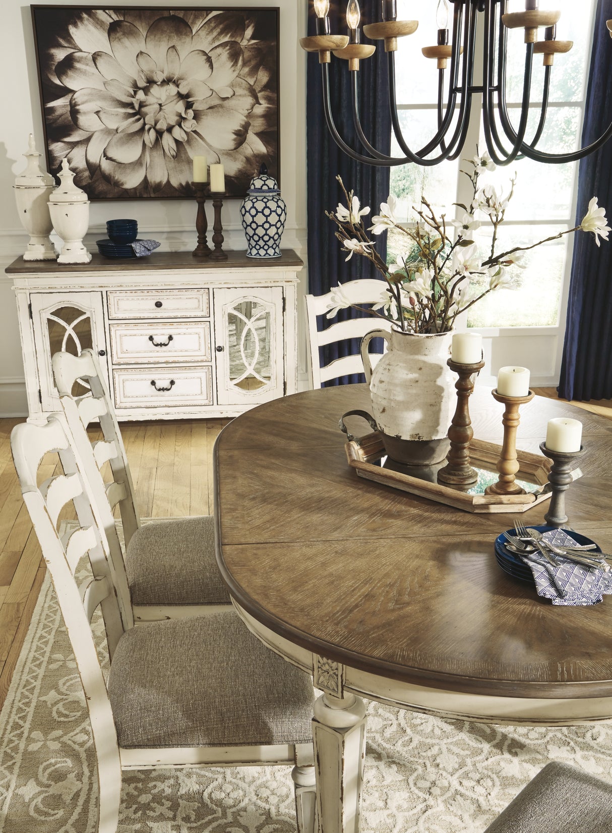 Realyn Chipped White Oval Dining Extension Table from Ashley Furniture - Luna Furniture