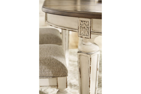 Realyn Chipped White Oval Dining Table and 6 Ladder Back Chairs from Ashley Furniture - Luna Furniture