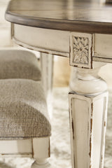 Realyn Chipped White Oval Dining Extension Table from Ashley Furniture - Luna Furniture