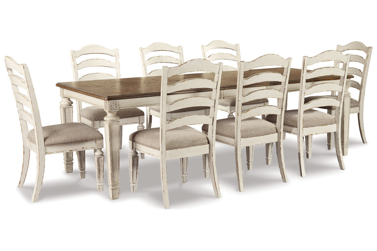 Realyn Chipped White Rectangular Dining Table and 8 Ladder Back Chairs from Ashley Furniture - Luna Furniture