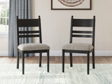 Greddinton Brown Dining Table and 4 Black Chairs from Ashley - Luna Furniture