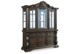 Maylee Dining Table and 8 Chairs with Storage in Dark Brown from Ashley - Luna Furniture
