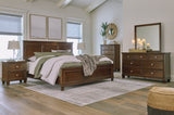 Danabrin King Panel Bed with Mirrored Dresser and 2 Nightstands in Brown from Ashley Furniture - Luna Furniture