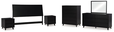 Danziar King Panel Headboard with Mirrored Dresser, Chest and 2 Nightstands in Black from Ashley - Luna Furniture