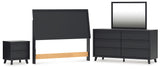 Danziar Queen Panel Headboard with Mirrored Dresser and Nightstand in Black from Ashley - Luna Furniture