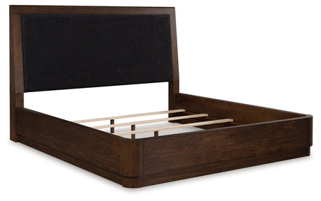 Dilenno Dark Brown California King Upholstered Panel Bed from Ashley - Luna Furniture