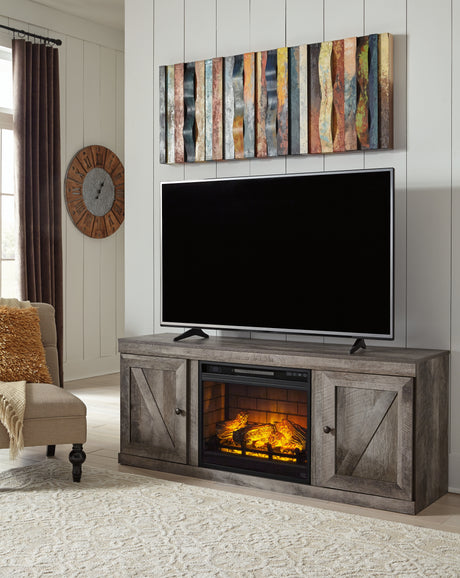 Wynnlow Gray TV Stand with Electric Fireplace from Ashley - Luna Furniture