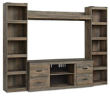 Trinell Brown 4-Piece Entertainment Center from Ashley Furniture - Luna Furniture