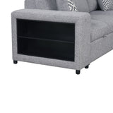 Chatteris Gray sectional sofa arm, open black bookcase shelf, close-up detail