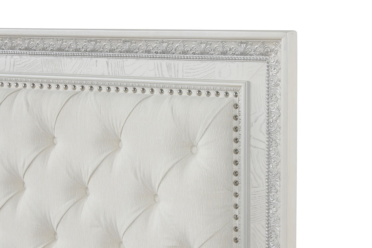 Stella Mia bed headboard detail, diamond tufting and nailhead trim, creamy white