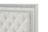 Stella Mia bed headboard detail, diamond tufting and nailhead trim, creamy white