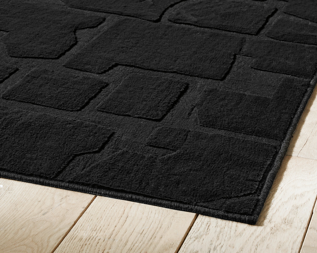 Gibbswell Black Washable Medium Rug from Ashley Furniture - Luna Furniture