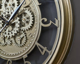 Gilover Champagne Finish Wall Clock from Ashley - Luna Furniture
