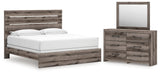 Graystorm King Panel Bed with Mirrored Dresser in Brown Gray from Ashley - Luna Furniture