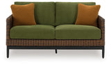 Horizon Hall Brown/Green Outdoor Loveseat with Cushion from Ashley Furniture - Luna Furniture