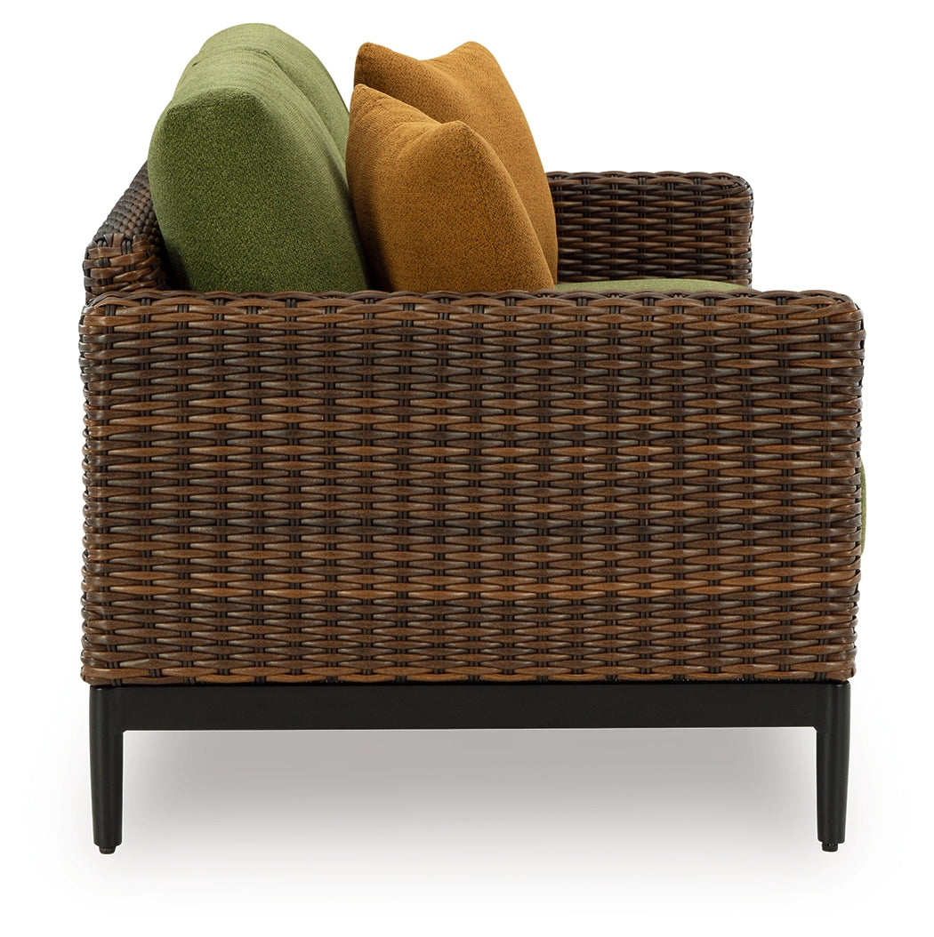 Horizon Hall Brown/Green Outdoor Loveseat with Cushion from Ashley Furniture - Luna Furniture