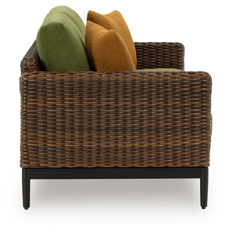 Horizon Hall Brown/Green Outdoor Loveseat with Cushion from Ashley - Luna Furniture