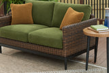 Horizon Hall Brown/Green Outdoor Loveseat with Cushion from Ashley Furniture - Luna Furniture