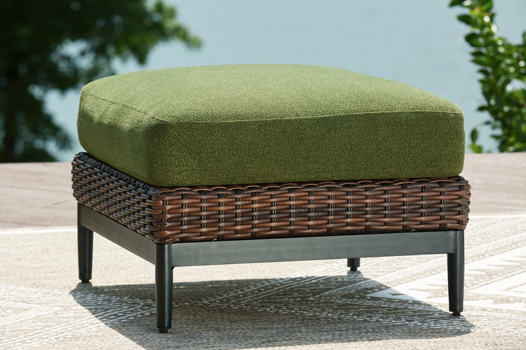 Horizon Hall Brown/Green Outdoor Ottoman with Cushion from Ashley Furniture - Luna Furniture