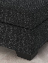 Jasmine Peaks Coal Ottoman from Ashley Furniture - Luna Furniture