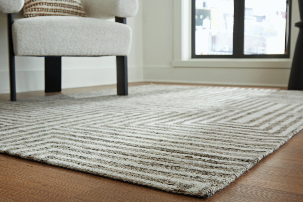 Jossen Ivory/Gray Medium Rug from Ashley Furniture - Luna Furniture