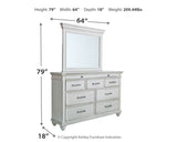 Kanwyn King Panel Bed with Mirrored Dresser, Chest and 2 Nightstands in Whitewash from Ashley - Luna Furniture