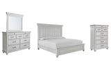 Kanwyn King Panel Bed with Mirrored Dresser and Chest in Whitewash from Ashley - Luna Furniture