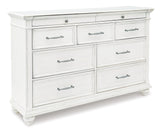 Kanwyn King Panel Bed with Storage with Dresser in Whitewash from Ashley - Luna Furniture