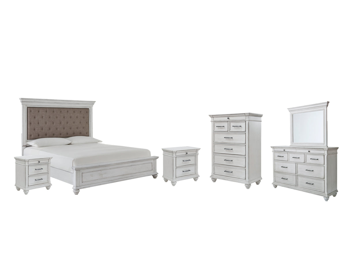 Kanwyn Queen Panel Bed with Mirrored Dresser, Chest and 2 Nightstands in Whitewash from Ashley - Luna Furniture