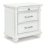 Kanwyn Queen Panel Bed with Mirrored Dresser, Chest and 2 Nightstands in Whitewash from Ashley - Luna Furniture