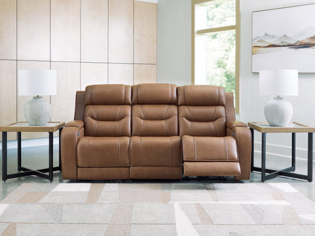 Knightington Caramel Power Reclining Sofa with Audio Seating from Ashley - Luna Furniture