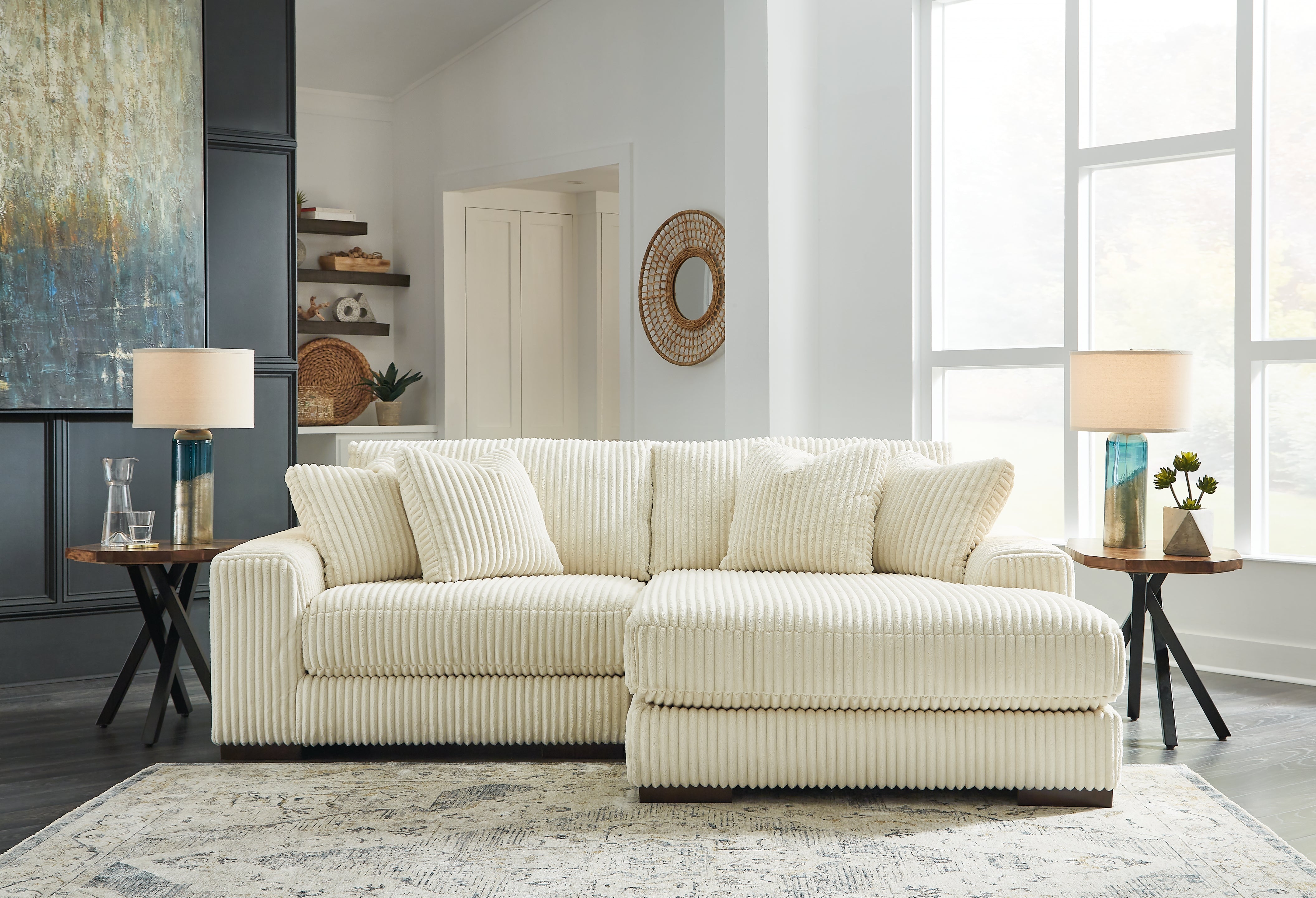 Ashley Lindyn Ivory 2-Piece Sectional with Ottoman – Luna Furniture