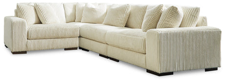 Lindyn Ivory 4-Piece Sectional with Ottoman from Ashley - Luna Furniture